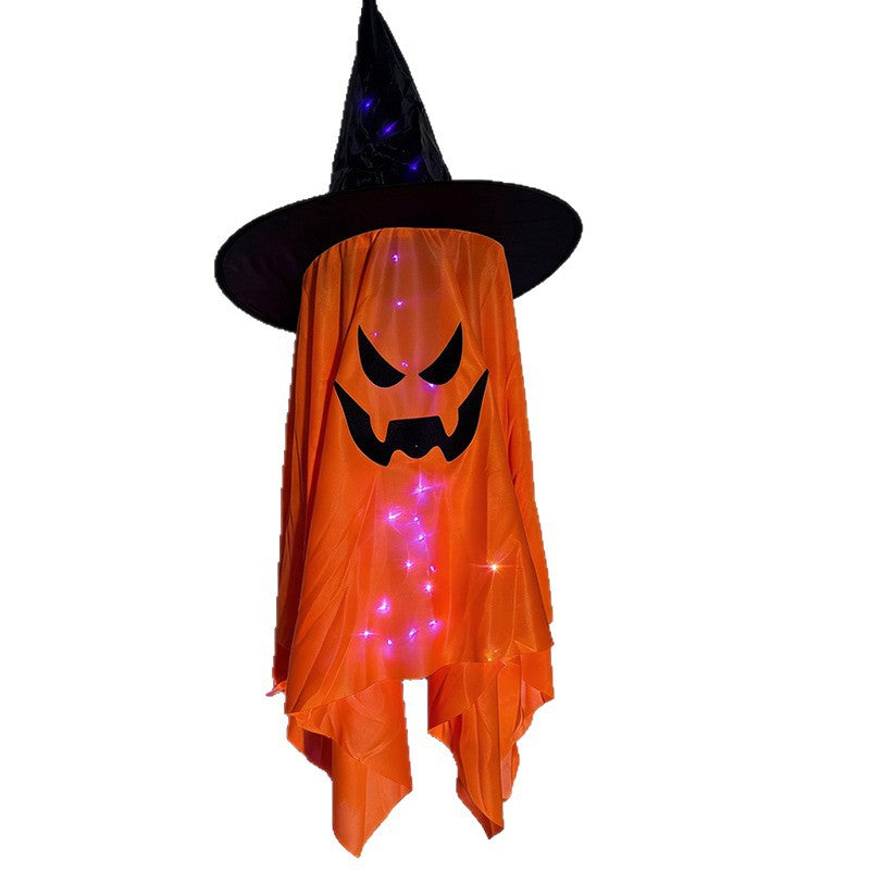 Glowing ghost decorations for Halloween featuring a light up witch hat ghost with orange fabric and spooky face.